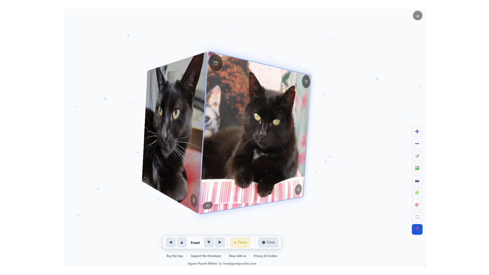 A rotating 3D cube gallery in Jigsaw Puzzle Maker displaying photos on its faces